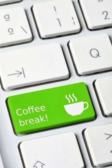 a green "coffee break" on a keyboard