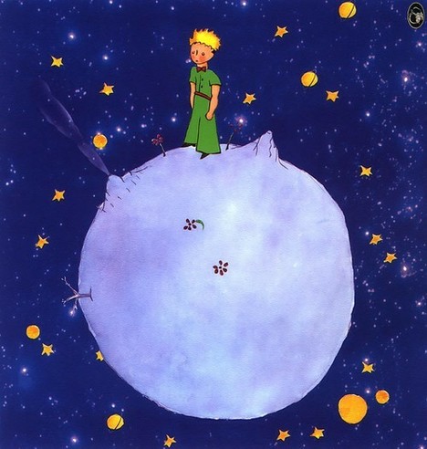 Drawing, mainly in blue and purple

Le Petit Prince (wearing green and blond hair), alone on a small planet, in space, with plenty of stars and other planets in the background.
Planet has: 2 volcanoes (1 active), a dried tree, 2 flowers