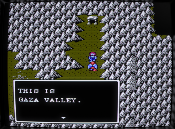 Screenshot from the NES video game Gargoyle's Quest II where player character Firebrand has encountered a non-playable character stating:
