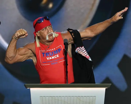 Terry G. Bollea aka Hulk Hogan tears his shirt off to show he’s wearing a Trump Vance shirt underneath 