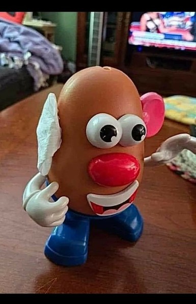 Mr Potato Head with a bandage of his right ear