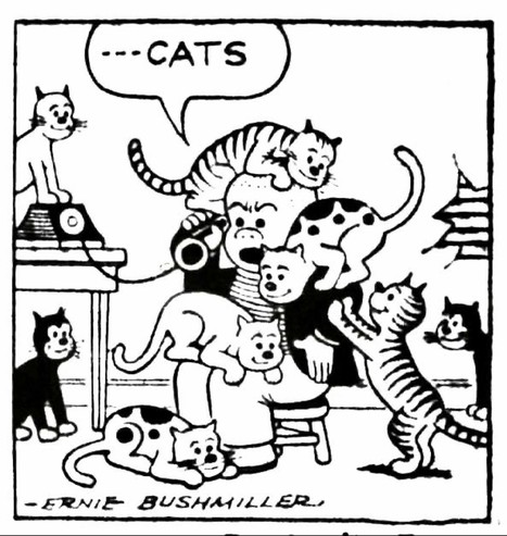 Sluggo, on the phone, totally surrounded by cats (looking like him?): 