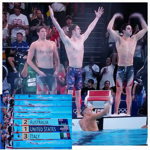 Team USA Men's free relay group cheering after winning GOLD in 4×100M.