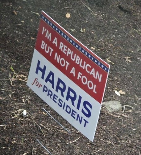 Lawn sign: 
Oh the top half, on a red background, the words, in white: 
