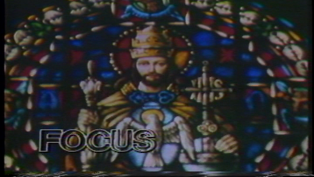 A church's stain class window of Jesus. The show's logo 