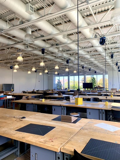 An architecture classroom. There are many work stations, but no student as it is Sunday.