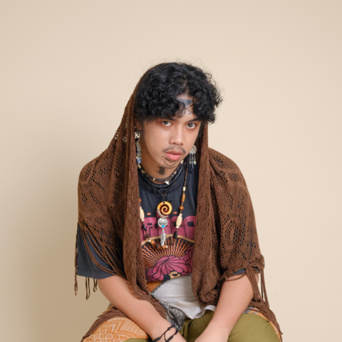 Me in my Boho outfit. I look directly into the camera with my eyebrow raised, as if to ask the ones who look on, "is this good enough for you?"
