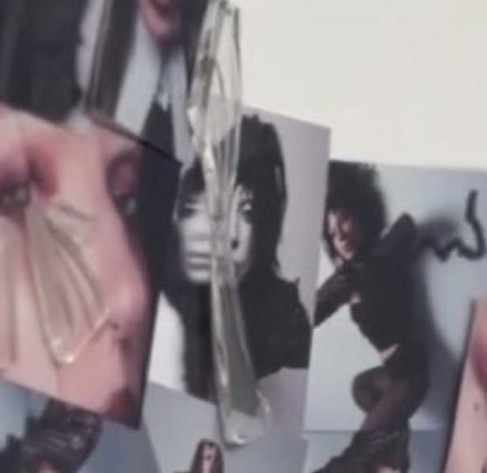 From the behind-the-scenes of creating the MAYHEM cover, showing a distorted monochrome image of Lady Gaga under a piece of cracked glass.