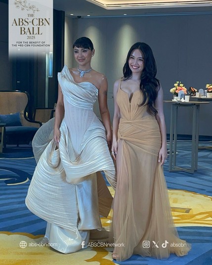 Nadine Lustre in a structured flowy pearly white dress. Kathryn Bernardo in a beige sheer long dress.
