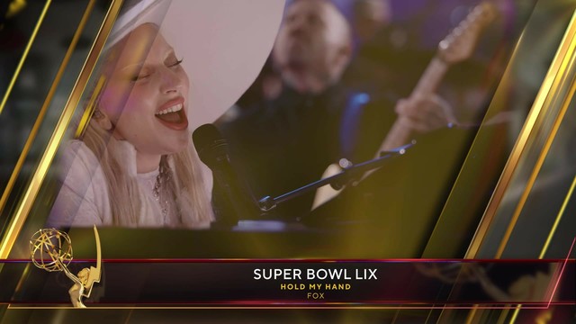 Lady Gaga wins the Sports Emmys for her performance of Hold My Hand at the Super Bowl LIX.
