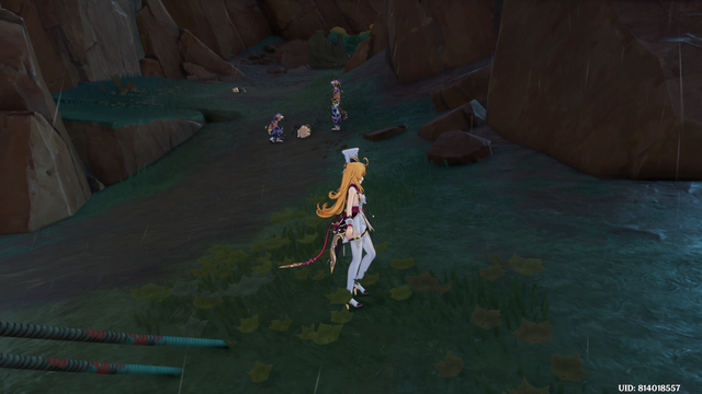 Two Natlanese mobs checking on a dead hilichurl's body.