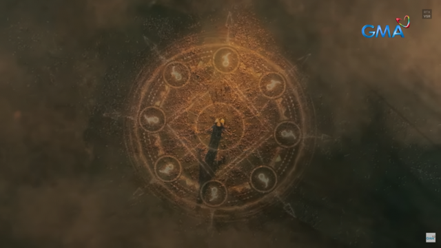 Danaya stands at the center of a glowing, ancient sigil inscribed with mystical symbols and animal totems, her figure casting a long shadow. The scene evokes a powerful ritual moment, surrounded by smoke and sacred geometry.
