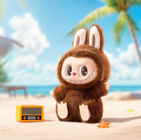 A brown Labubu in a beach