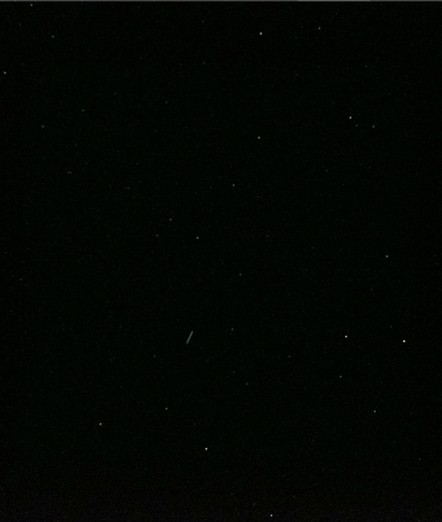 The photo shows a black sky with stars, it has been taken with a digital camera, 23mm, 1.0 Sek. f/2,8 ISO 51200 5000 K, self-timer, not denoised, red dots are artifacts, a green-blue stroke is probably the track of a satellite. The take did happen exactly in the night from 19th to 20th June at 1:30 pm.