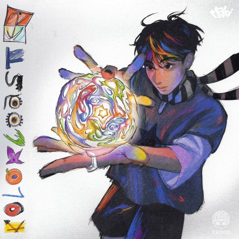 A colorful illustration shows a person with black and multicolored hair holding a glowing orb that's filled with swirling shapes of various colors. The album title, "KOLORKASTER," is written in colorful, stylized text vertically on the left side of the image.