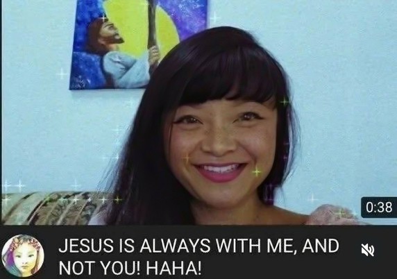 Youtube thumbnail of a 38-second video from a Filipina. The title of the video is "Jesus is always with me, and not you! Haha!"