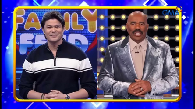 Screen capture from the Philippine installment of Family Feud, showing its host Dingdong Dantes and Family Feud US host Steve Harvey side-by-side on a split screen layout.
