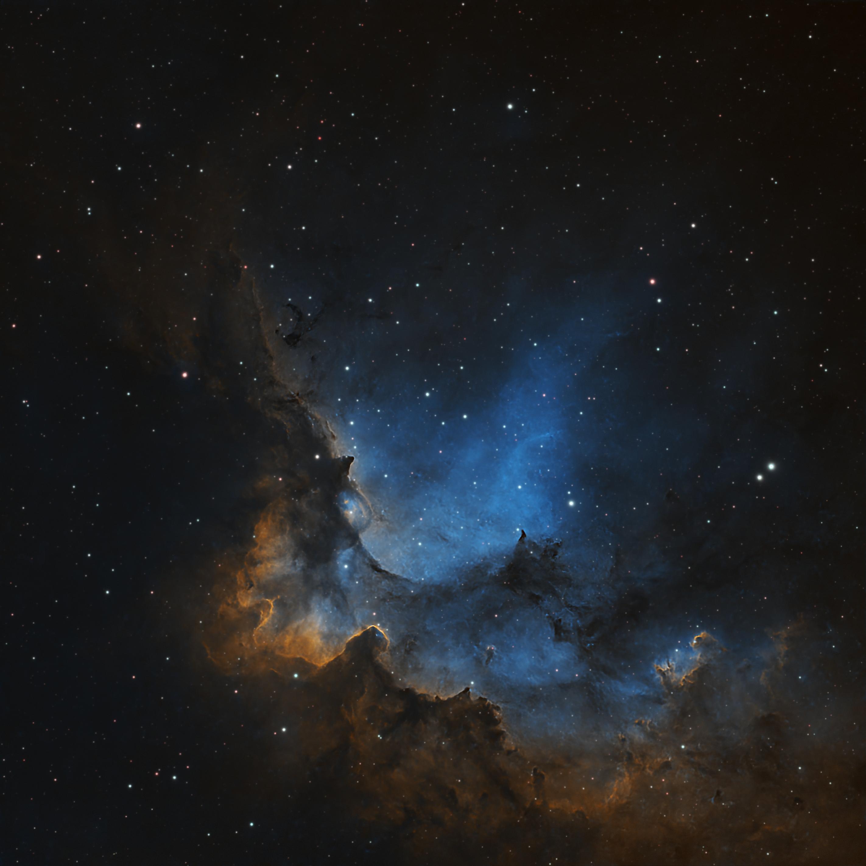 NGC 7380 - AKA the Wizard nebula in pseudo-SHO
With a bit of imagination one can see the profile of a man with a cone-shaped hat, and their hands protruding from under a coat